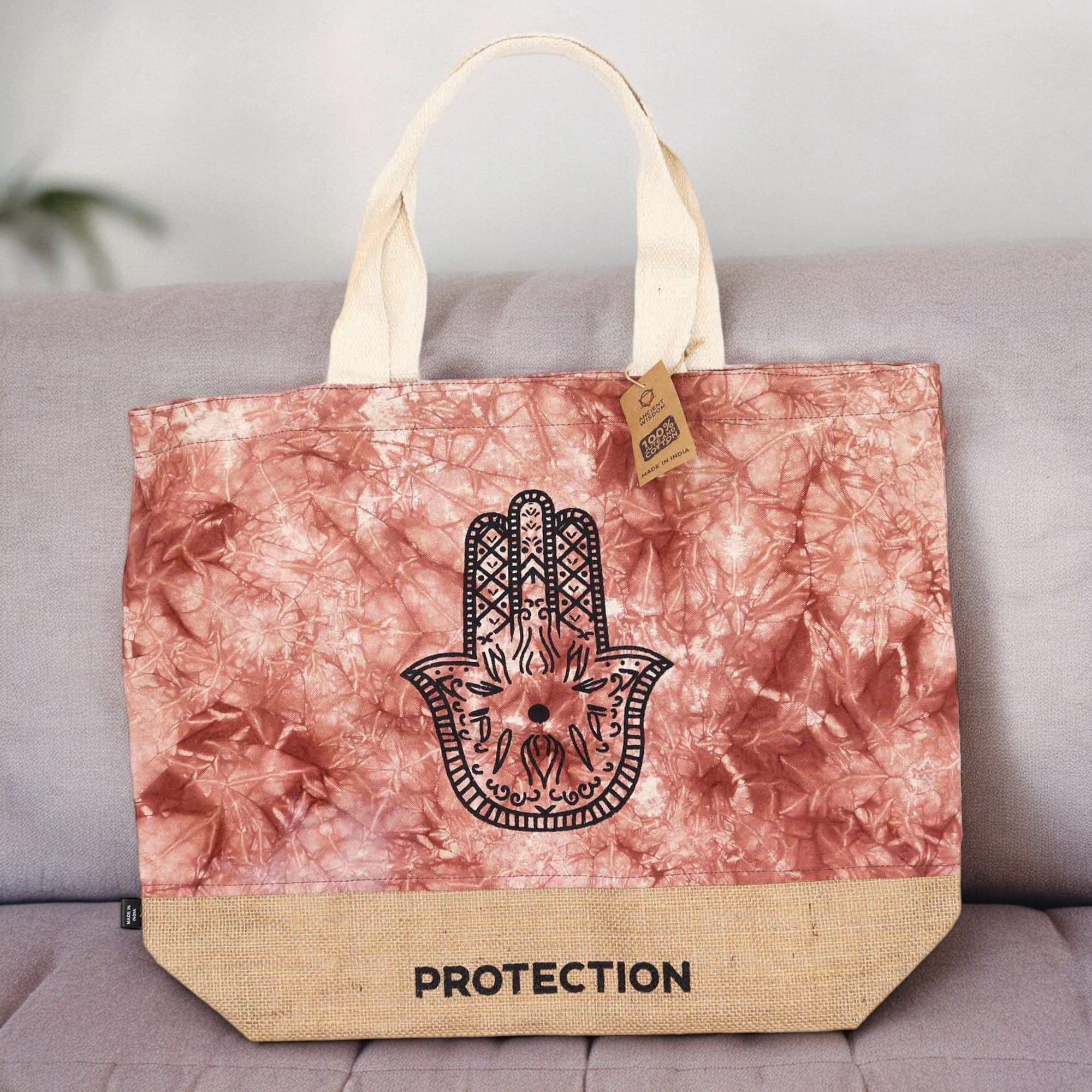 247575 Detail motívu ochrannej ruky Hamsa na prírodnej taške